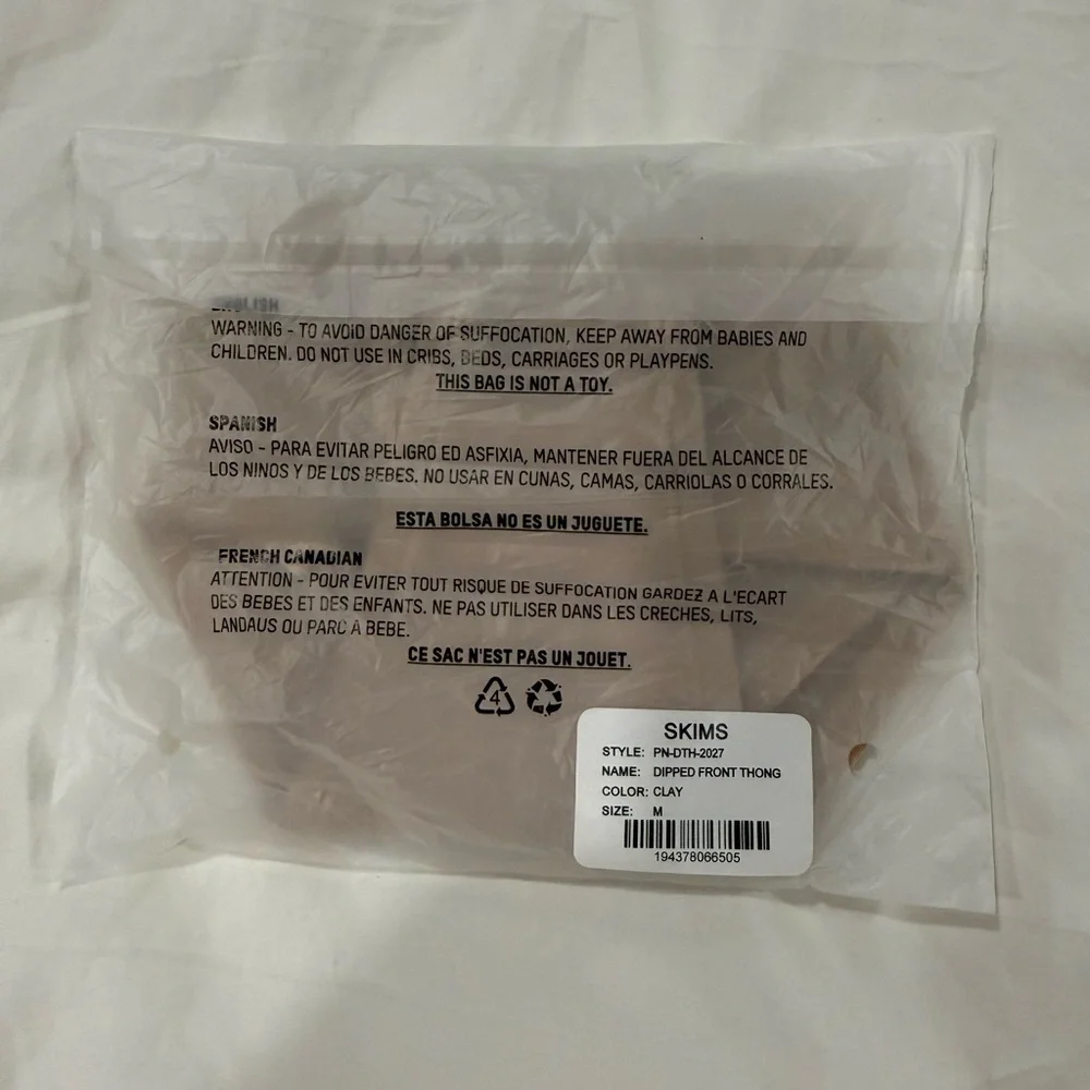SKIMS DIPPED FRONT THONG IN COLOR CLAY SZ M